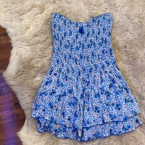 Poupette St Barth blue dress with Detailed Tassel. Flattering for every figure